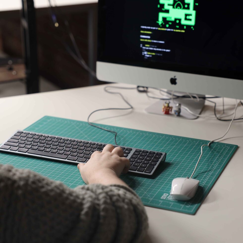 MetStudios student seated, using a computer