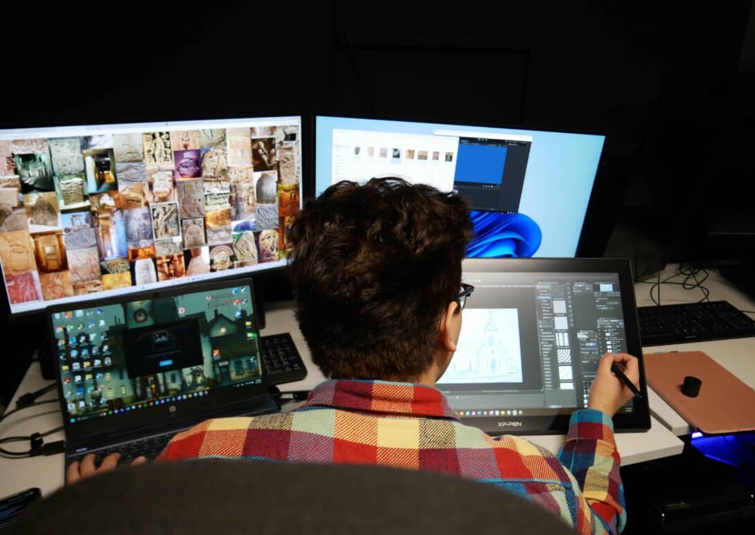 Closeup of MetStudios student working at computer