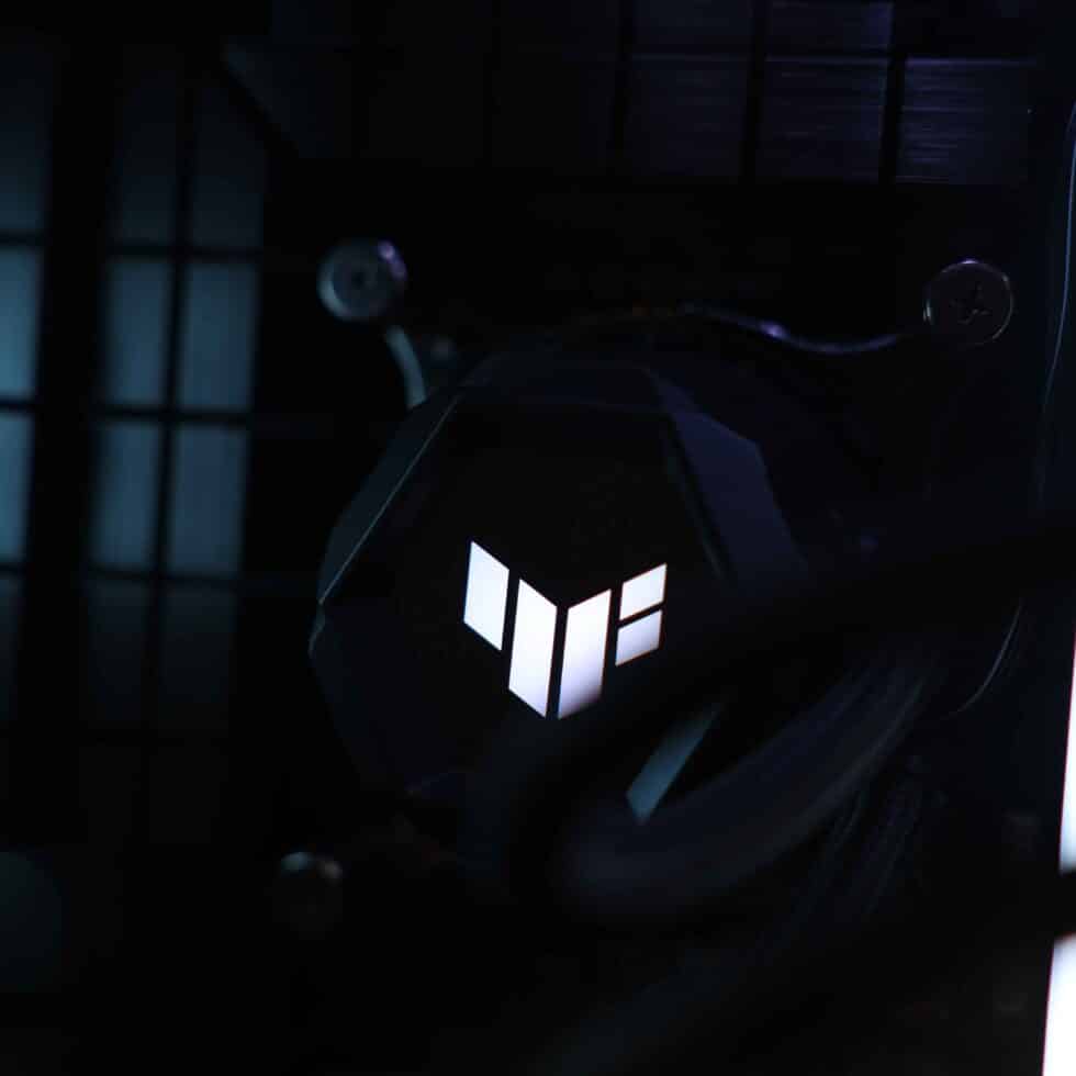 Closeup of gaming headset hanging on hardware