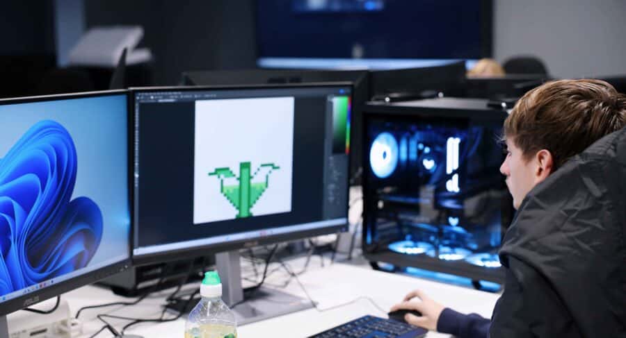 MetStudios Brighton Student seated at desk using a PC