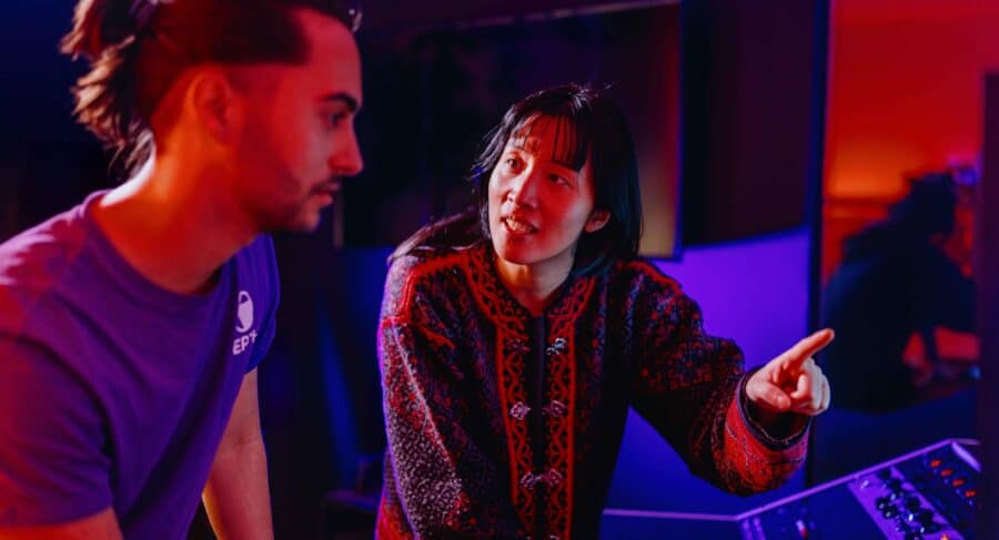 MetStudios game design student talking with lecturer